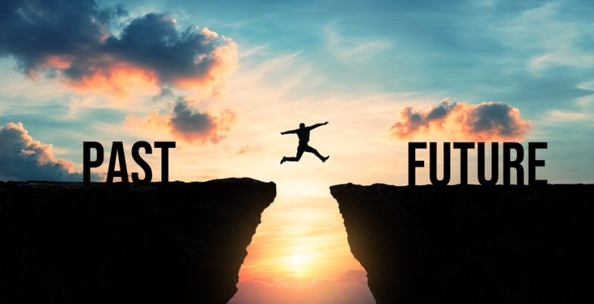 Silhouette,Of,A,Person,Jumping,From,Past,To,Future,Over