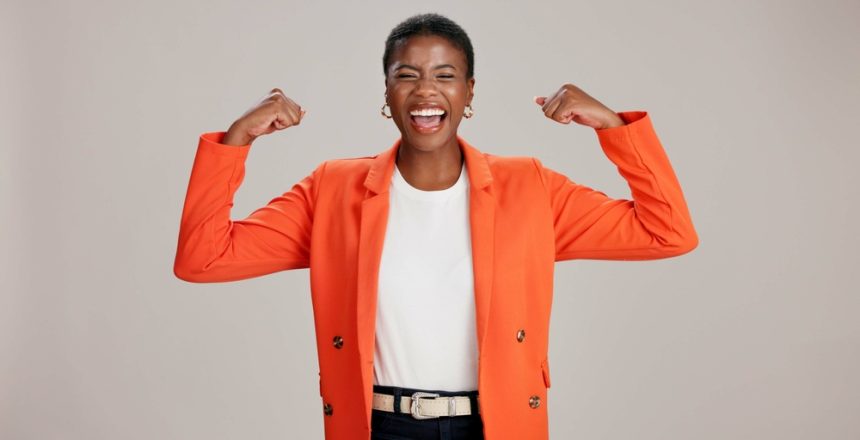 Black,Woman,,Business,Or,Happy,In,Studio,With,Flex,,Empowerment