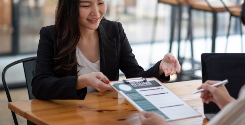 Job,Interview,In,Office,,Focus,On,Resume,Writing,Tips,,Employer
