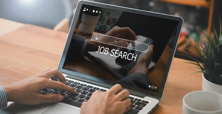 Job,Search,Concept.,Man,Using,Laptop,For,Job,Search,Concept.
